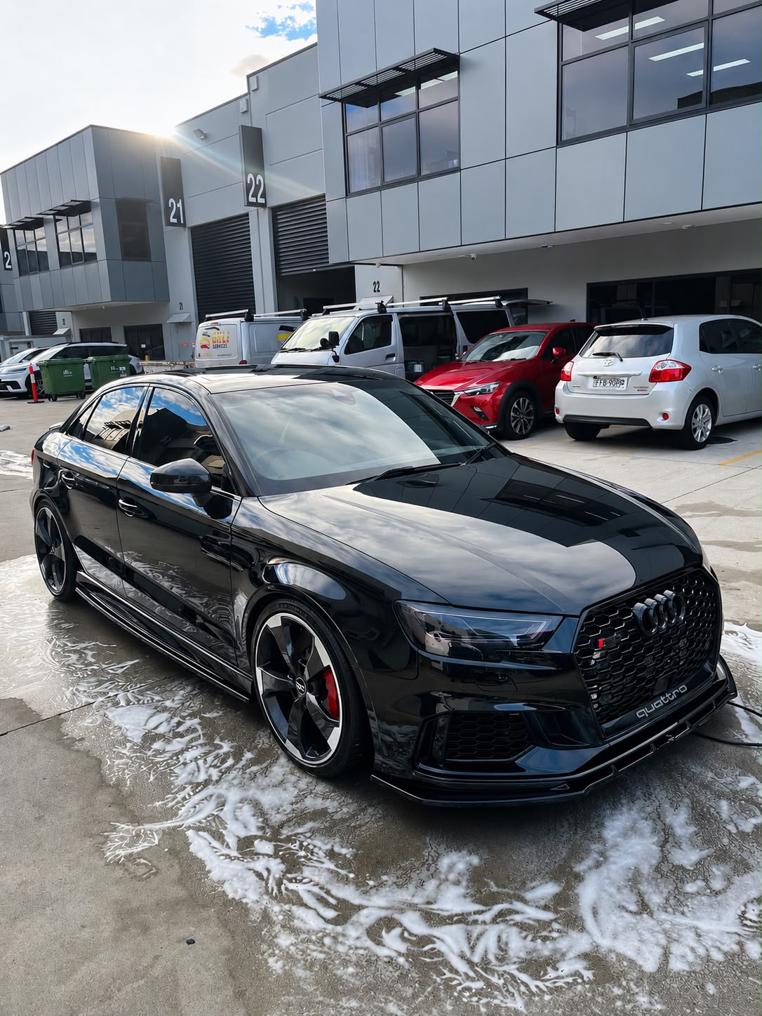 Black Audi with reflective ceramic coating finish